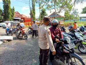 Jajaran Polsek Tanasitolo Lakukan Giat Operasi Yustisi Vaksinasi 1,2 Dan 3